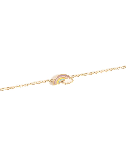 Gold necklace with a small rainbow charm on a white background